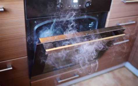why is smoke coming out of my stove